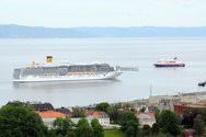 Costa Deliziosa arriving Trondheim harbour June 2012. The Coastal Express vessel MS «Nordkapp» is leaving the harbour.
